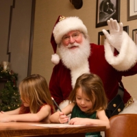 Big Red Santa with children